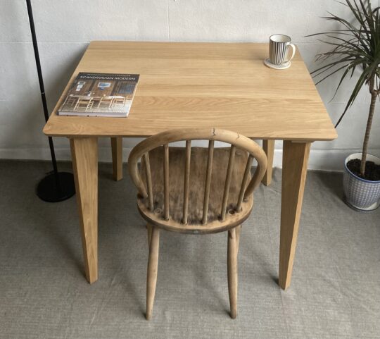 Square solid oak desk and table top with chair in living room