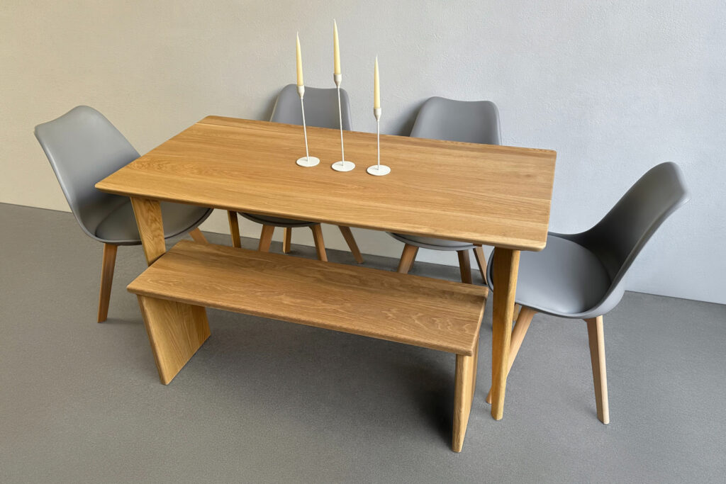 ATO 55 solid oak dining table with a Henge 20 bench in a dining room