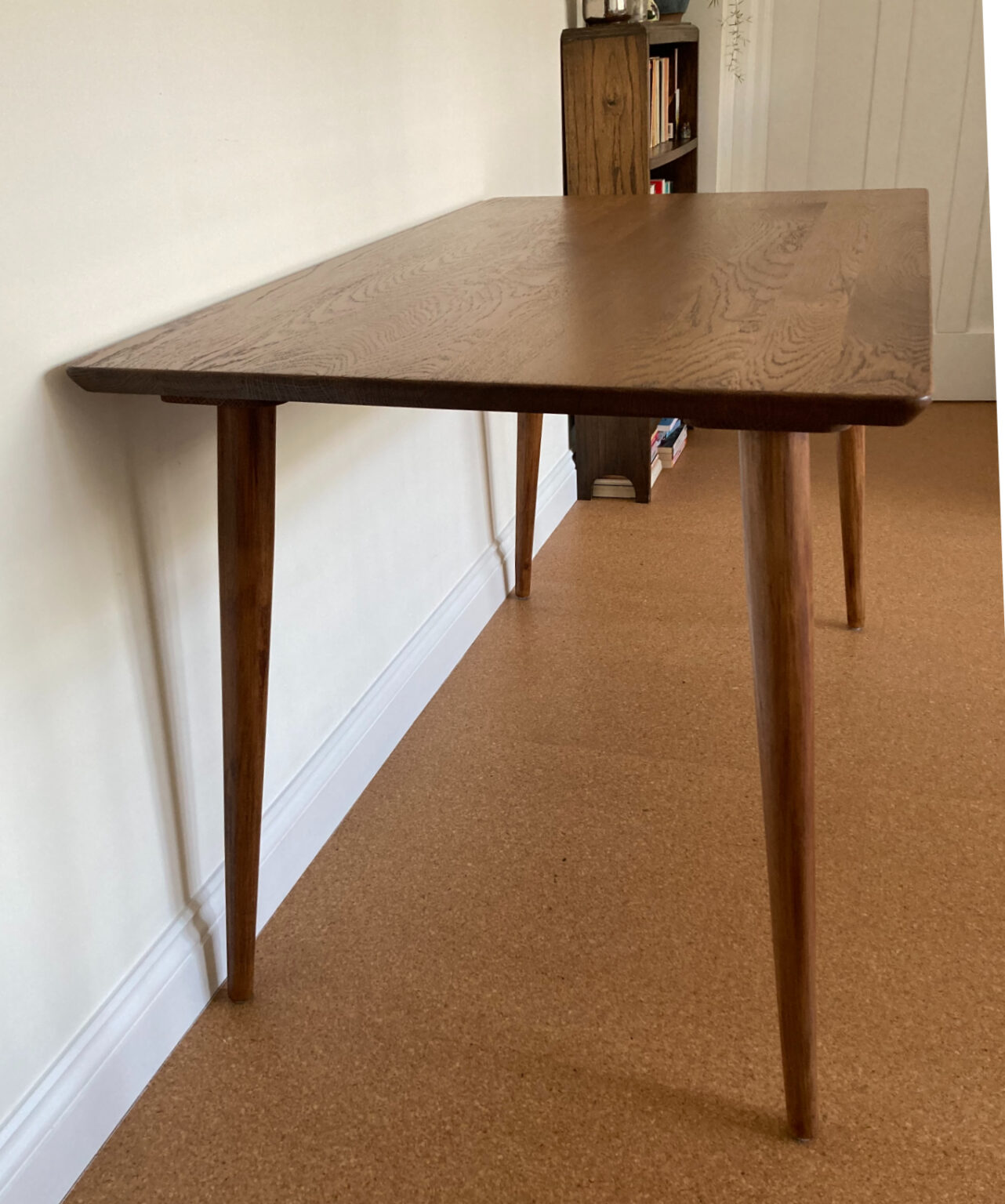 Bespoke round wooden table with tapered legs